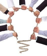 Hands holding rope forming bulb, idea concept